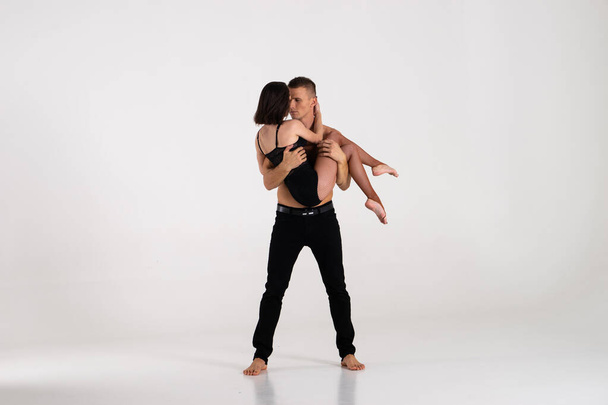 Duo Of two dancers Showing pose, Isolated On White - Valokuva, kuva