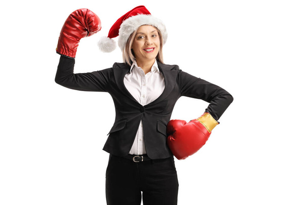 Successful businesswoman with boxing gloves raising hand like a  - Photo, Image