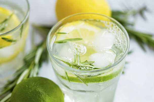 Lime and lemon mojito cocktails, fresh summer drink with ice and - 写真・画像
