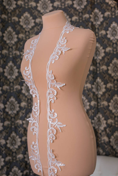 White lace stock photo on dummy, mannequin - Photo, Image