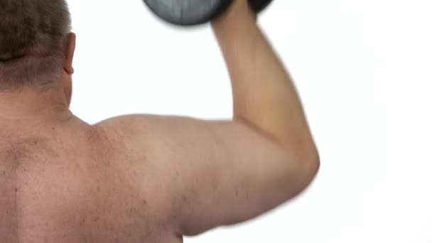 Close-up de homem gordo está se exercitando com pesos
. - Filmagem, Vídeo