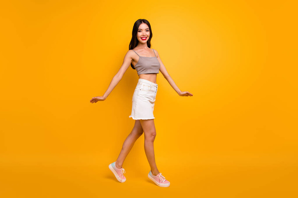 Profile side full length body size photo of graceful charming fascinating cute youngster dancing like ballerina in footwear smiling toothily isolated vivid color background - Photo, Image