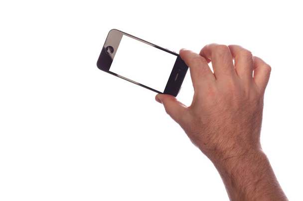 phone in hand - Фото, зображення