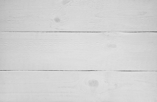空の木製の白いテーブル。塗装された板の背景 - 写真・画像