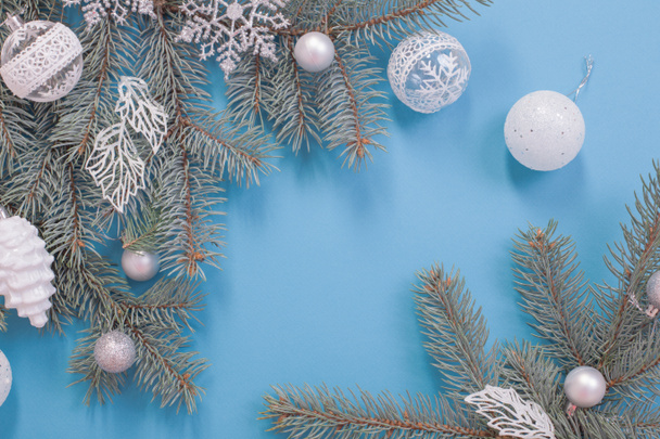 Christmas decorations on blue paper background  - Foto, Imagen