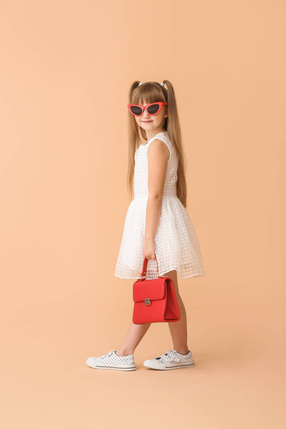 Fashionable little girl on color background - Fotoğraf, Görsel