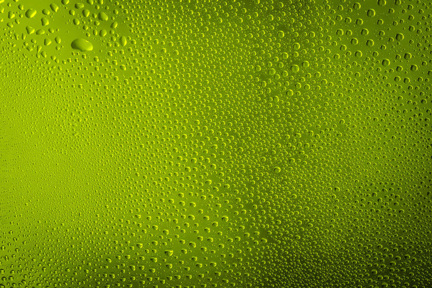 zöld, sárga vízcseppek zöld színű elvont háttér - Fotó, kép