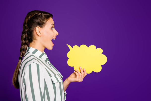 Profile photo of funny beautiful lady hold paper mind cloud creative way for talk sharing news gossips rumors wear striped shirt isolated purple color background - Foto, Imagem