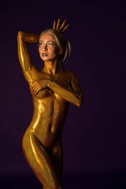 Nude girl with bodyart against purple background - Fotoğraf, Görsel