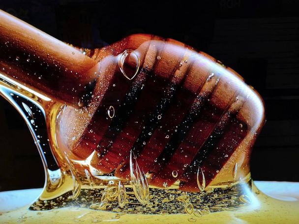 detailní záběr dřevěného medu v medu - Fotografie, Obrázek