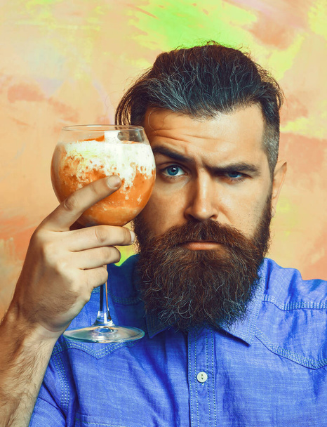 Brutal caucasian hipster with moustache with tropical alcoholic fresh cocktail - Zdjęcie, obraz