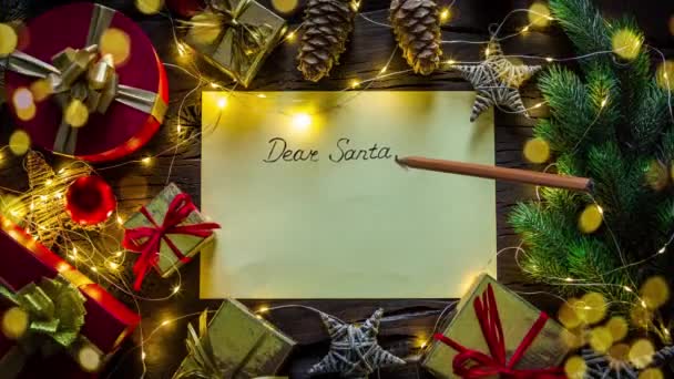 Noel Baba 'ya yazılmış bir mektup, hediyeler ve Noel süslemeleri içeren animasyon videosu.. - Video, Çekim