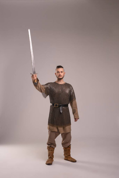 Handsome man in viking image full-length view - Photo, image