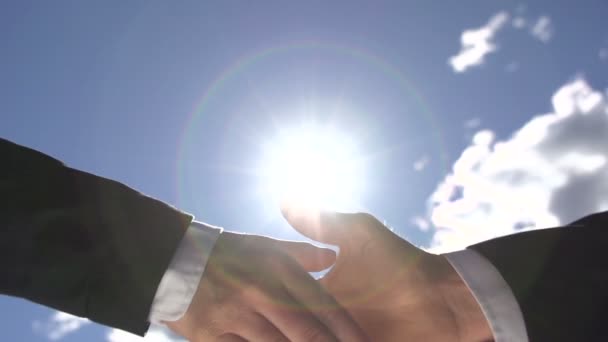 Handshake over the sun - Footage, Video