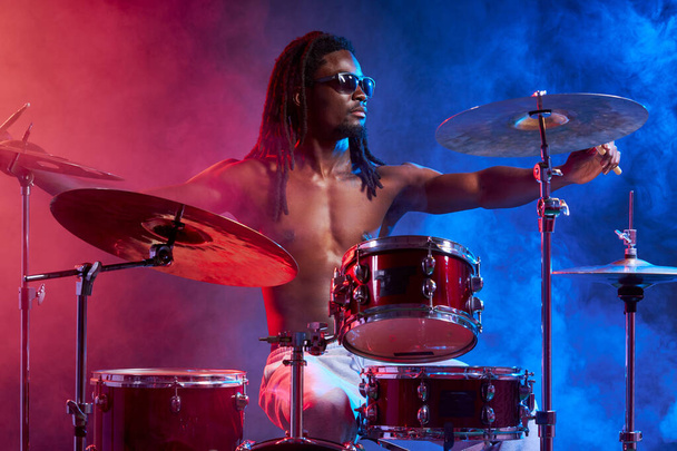 modern stylish african man playing on drums - Fotoğraf, Görsel