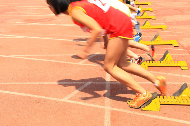 Sports meeting, the athlete sprint start - Photo, Image