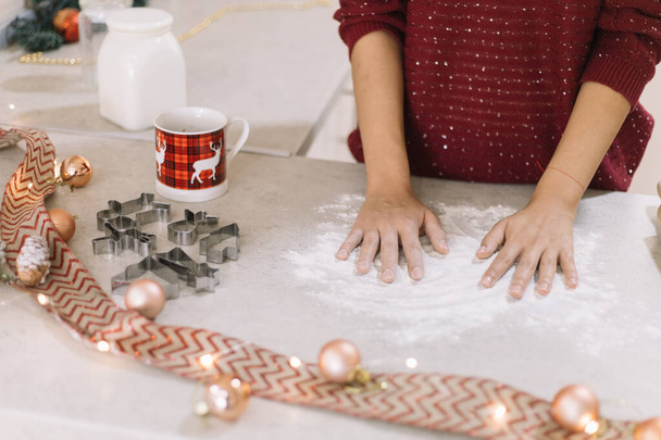 Females hands over spilled flour on kitchen bar - Φωτογραφία, εικόνα