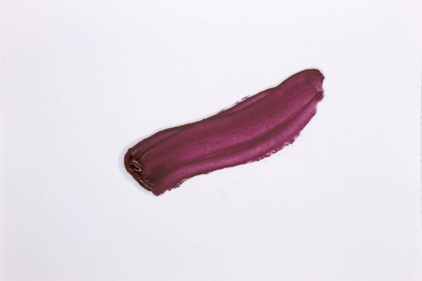 This is a photograph of a Burgundy Lipstick swatch isolated on a White background - Photo, Image