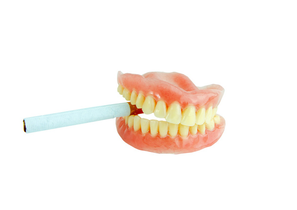 総義歯の喫煙は歯の分離に染色しています。 - 写真・画像