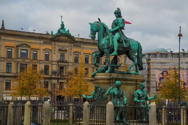 COPENHAGEN, DENMARK: Kongens Nytorv - public square in Copenhagen, Denmark. The equestrian statue of Christian V. - Fotoğraf, Görsel