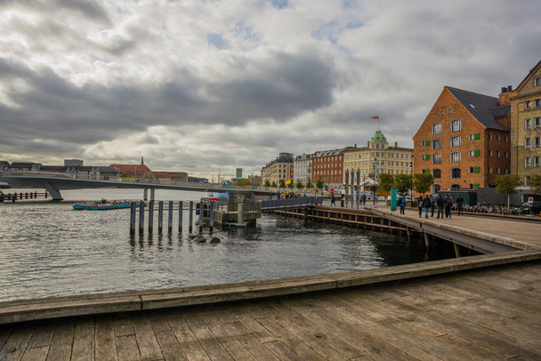 COPENHAGEN, DENMARK: Beautiful panoramic view from the waterfront to the buildings and the river. - Photo, Image