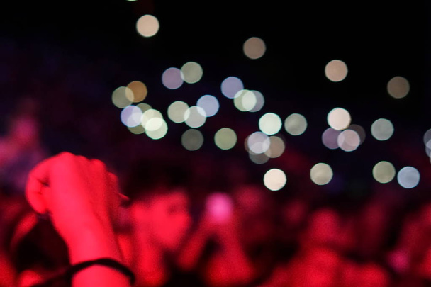 concert background, hand up , blurry background, beautiful bokeh live concert - Photo, Image