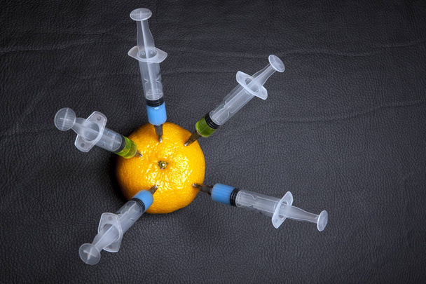 nitrate syringe fruit leather background  - Фото, изображение