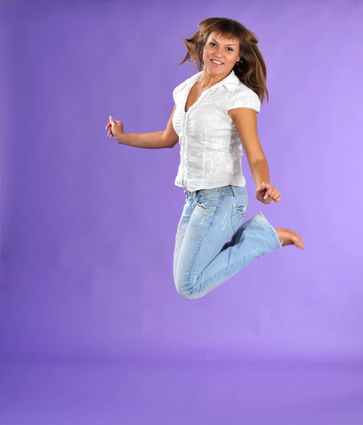Positive happy jumping caucasian woman - Photo, image