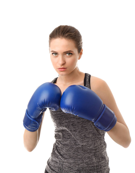 Sporty female boxer on white background - Фото, изображение