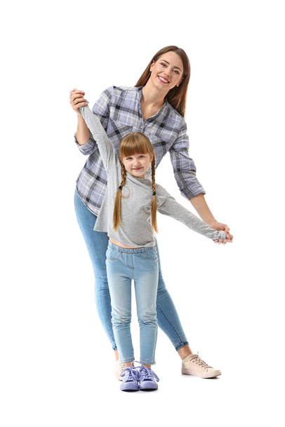 Portrait of happy mother and daughter on white background - Foto, Imagem