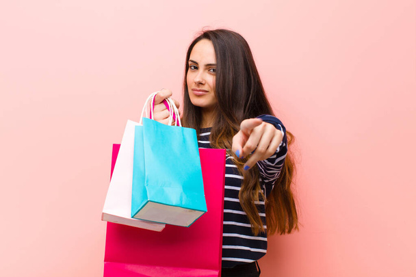 young pretty woman with shopping bags - Foto, Bild