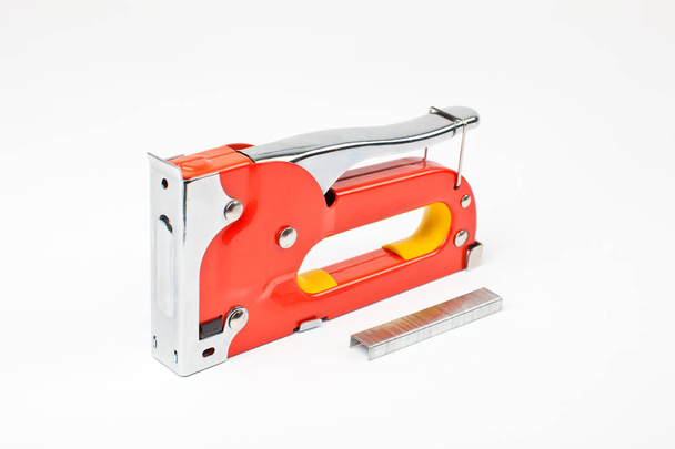 New portable furniture stapler closeup on white background - Photo, Image
