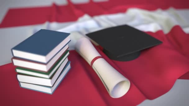 Выпускной колпачок, книги и диплом об австрийском флаге. Концептуальная 3D анимация высшего образования в Австрии
 - Кадры, видео