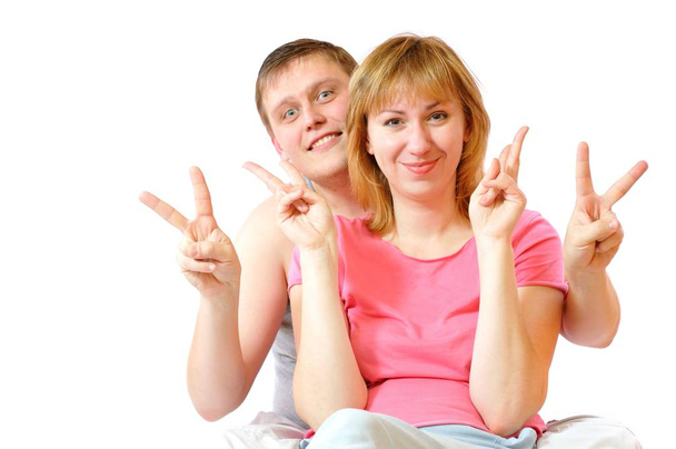 Couple of parents show gesture big fingers - 写真・画像