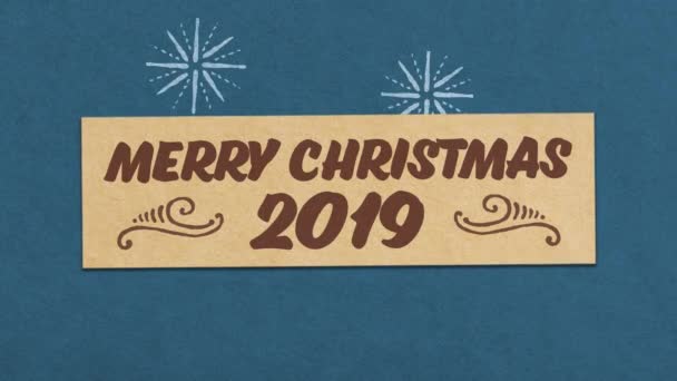 Boldog karácsonyt 2019 Üdvözlőlap kék papíron texturált háttér. Ideális a karácsonyi projekthez. Zökkenőmentes kiváló minőségű 4k Animáció - Felvétel, videó