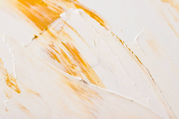 Artistic abstract texture background, golden acrylic paint brush - Foto, imagen