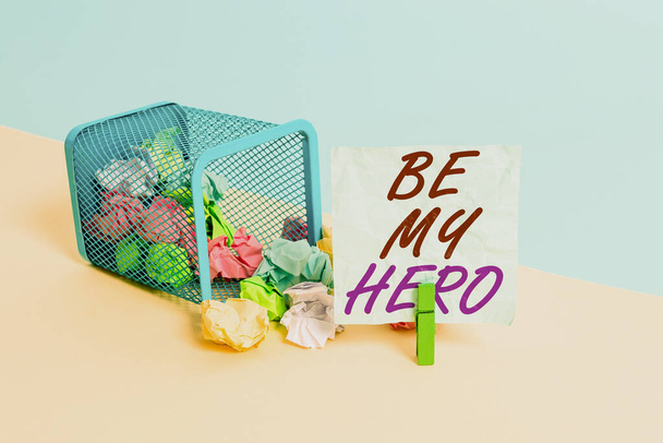 Handwriting text Be My Hero. Concept meaning Request by someone to get some efforts of heroic actions for him Trash bin crumpled paper clothespin empty reminder office supplies tipped. - Photo, Image