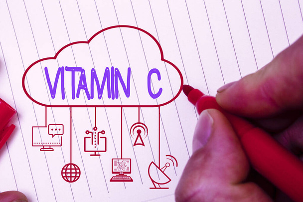 Schreibnotiz mit Vitamin C. Geschäftsfoto, auf dem es die Heilung fördert und dem Körper hilft, Eisen-Ascorbinsäure aufzunehmen. - Foto, Bild