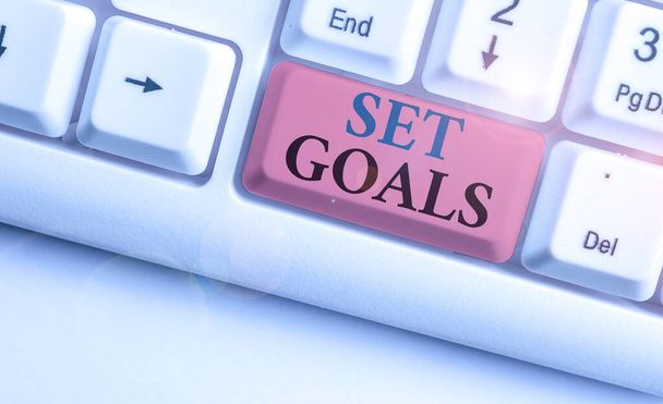 Conceptual hand writing showing Set Goals. Business photo showcasing Defining or achieving something in the future based on plan. - Photo, Image