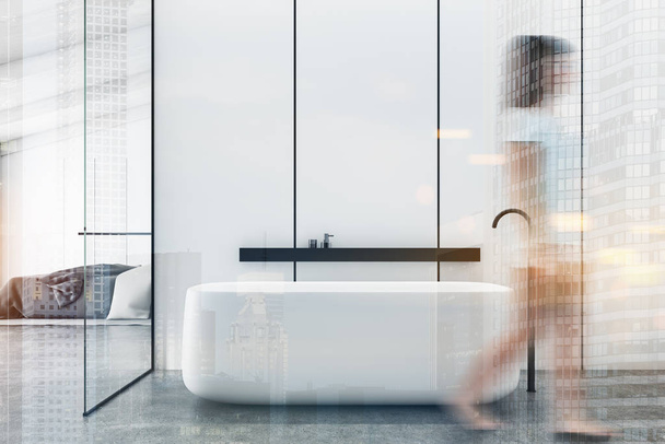 Woman walking in white bathroom and bedroom - Photo, image