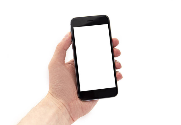 Hombre sosteniendo teléfono móvil negro, mano sosteniendo teléfono inteligente con pantalla blanca aislada en fondo blanco
 - Foto, imagen