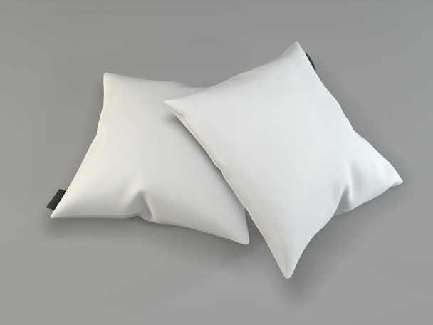 Twee witte kussens op een grijze achtergrond. Mockup vierkante kussens.  - Foto, afbeelding