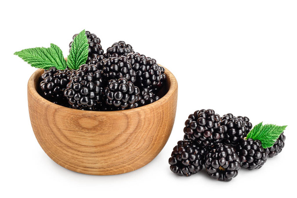 blackberry with leaf in wooden bowl isolated on a white background closeup - Photo, Image