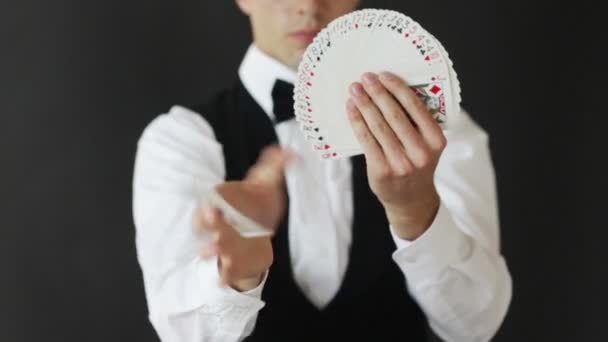 Footage of man showing card tricks - Felvétel, videó