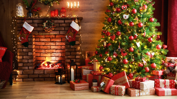 interior christmas. magic glowing tree, fireplace, gifts in  dar - Photo, Image