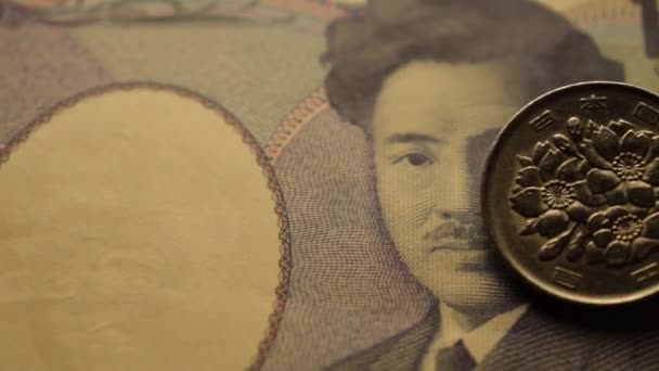 Közel érme és japán bankjegy - Felvétel, videó