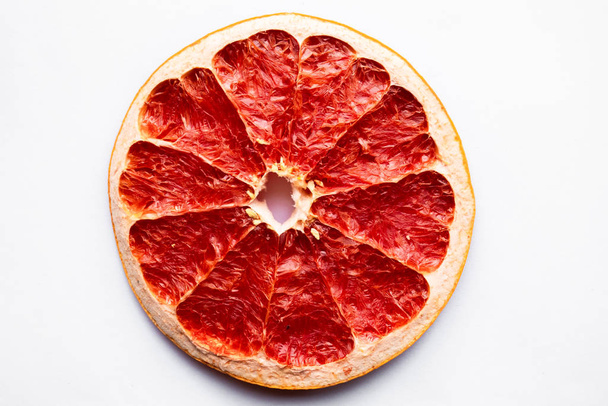 Close up grapefruit (Citrus paradisi) isolate on white background. - Photo, image