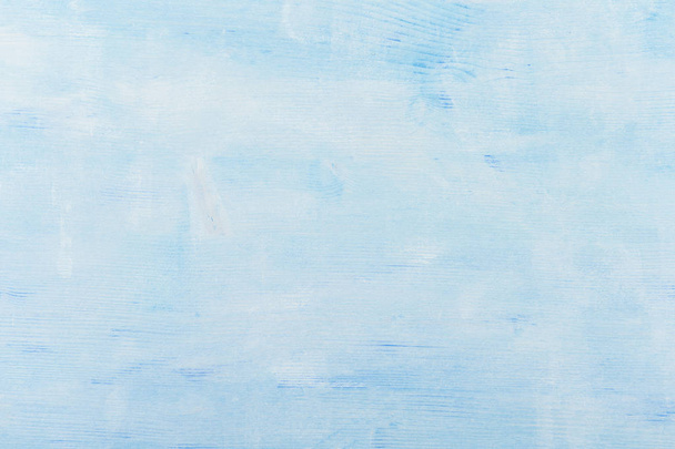 Textura de superficie de madera azul claro. Primer plano, vista superior, franjas horizontales
. - Foto, Imagen