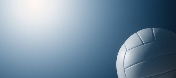 Деталі білого шкіряного волейболу на синьому фоні
 - Фото, зображення
