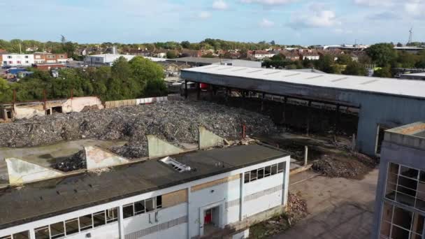 Aerial view of a warehouse destroyed by fire and filled with waste junk, Margate, Kent, UK - 映像、動画